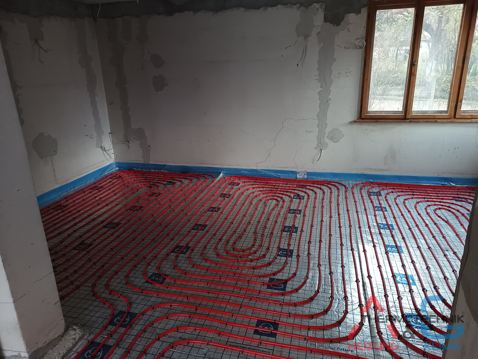 Installation von Fußbodenheizung in einem Haus - Bild 14