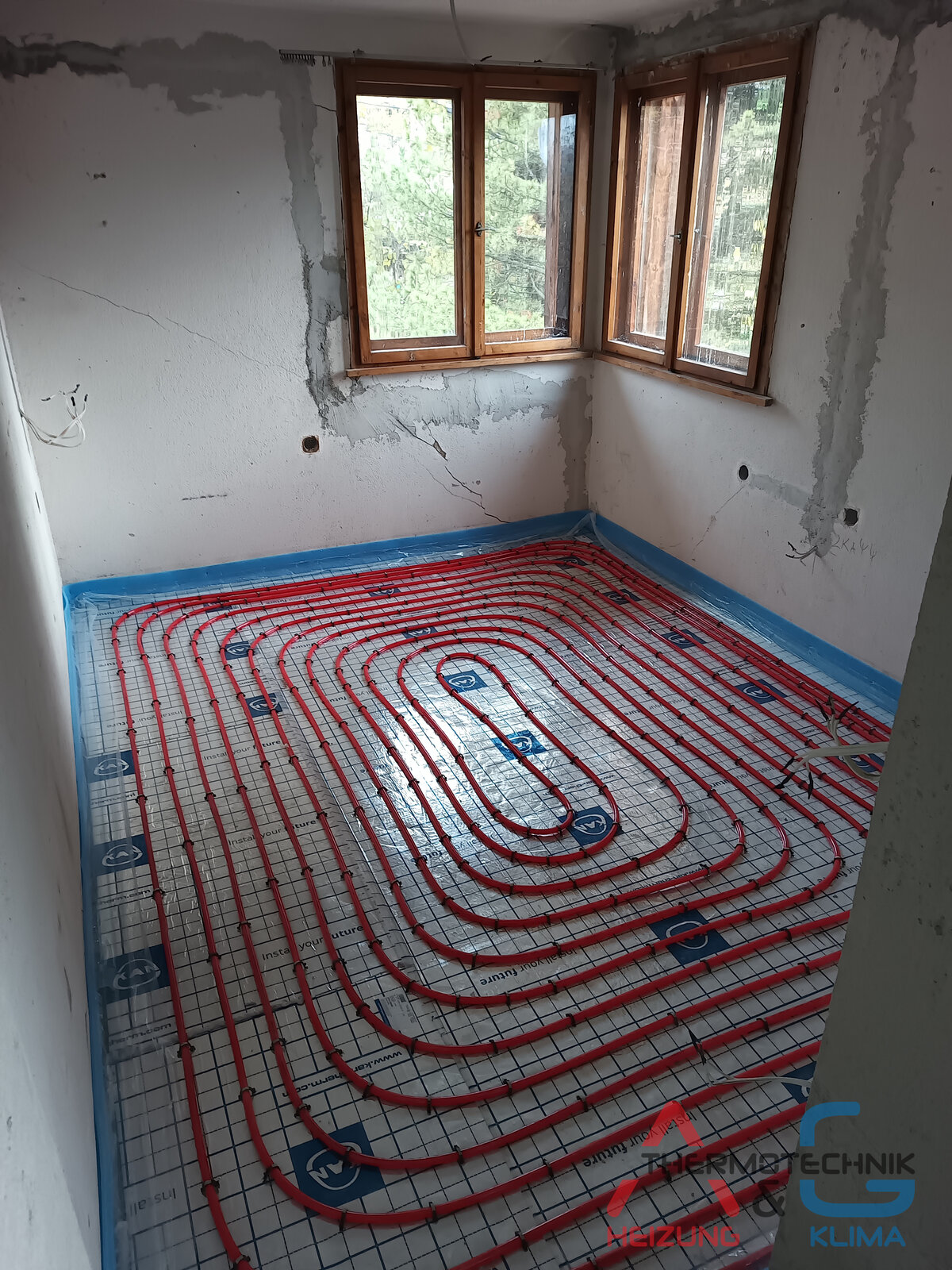 Installation von Fußbodenheizung in einem Haus