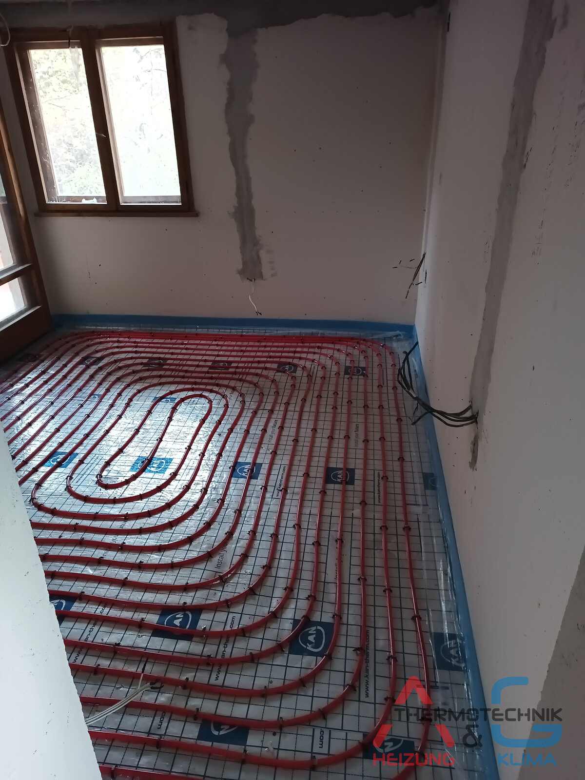 Installation von Fußbodenheizung in einem Haus - Bild 2