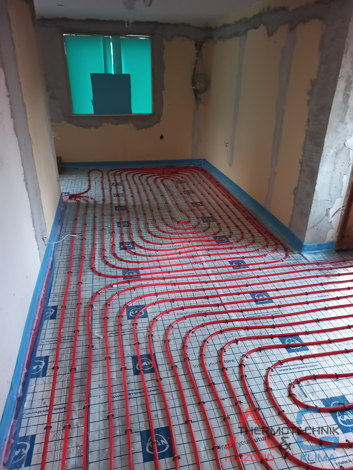 Installation von Fußbodenheizung in einem Haus - Bild 3