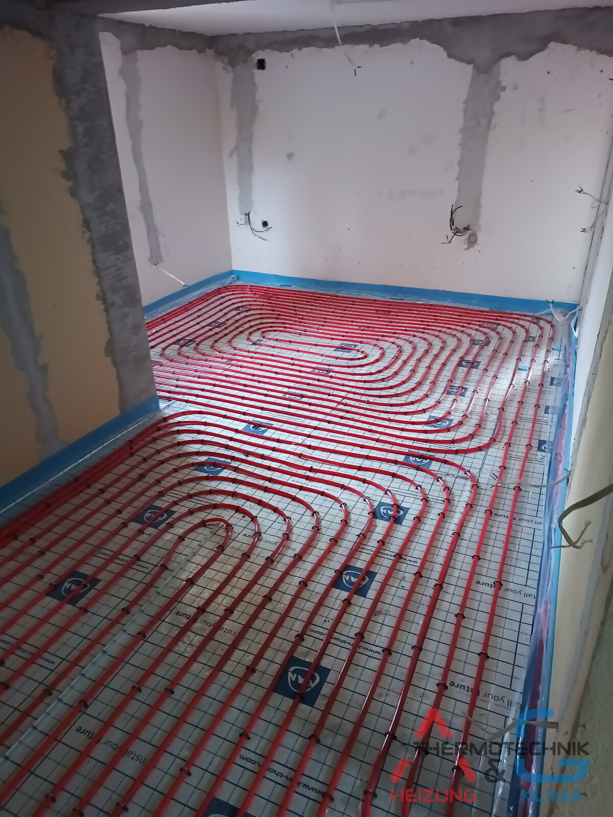 Installation von Fußbodenheizung in einem Haus - Bild 5